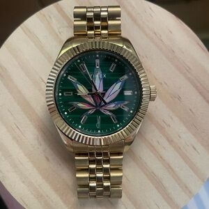 Jacquie aiche/times collab watch. Yellow gold with malachite face